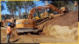 Site Preparation - check the local laws about retaining walls constructions