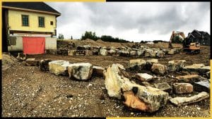 Acreage Landscaping construction with natural boulder rocks