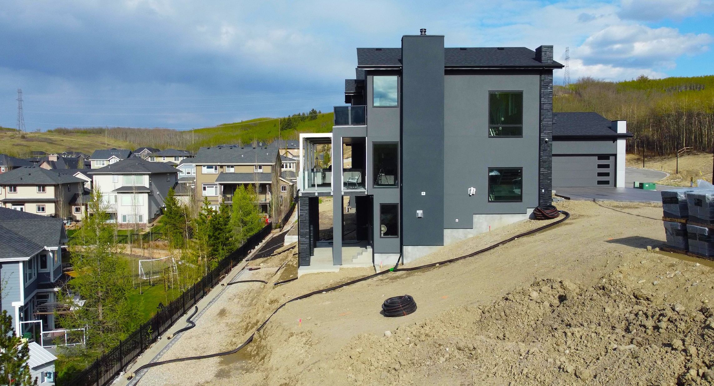 Crestmont side yard after — seamless transition with stepping stones