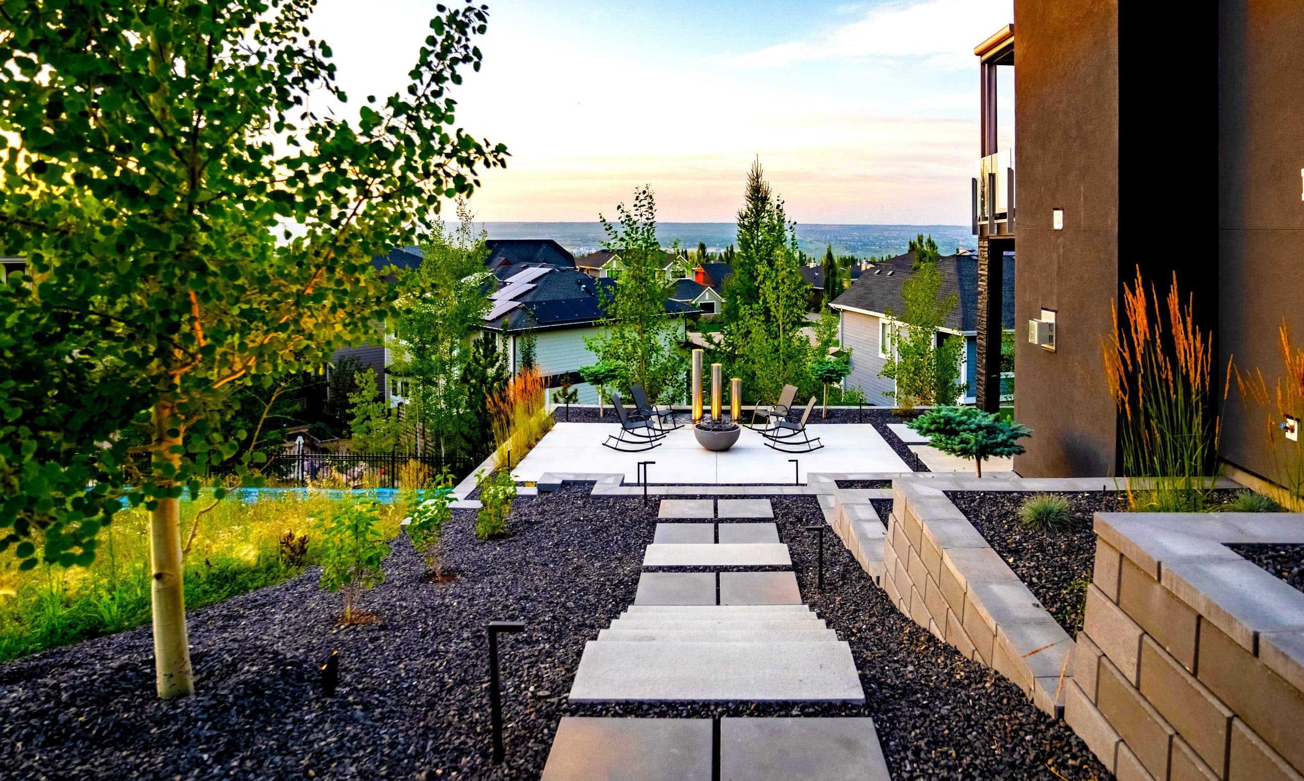 Crestmont side yard before — steep grade
