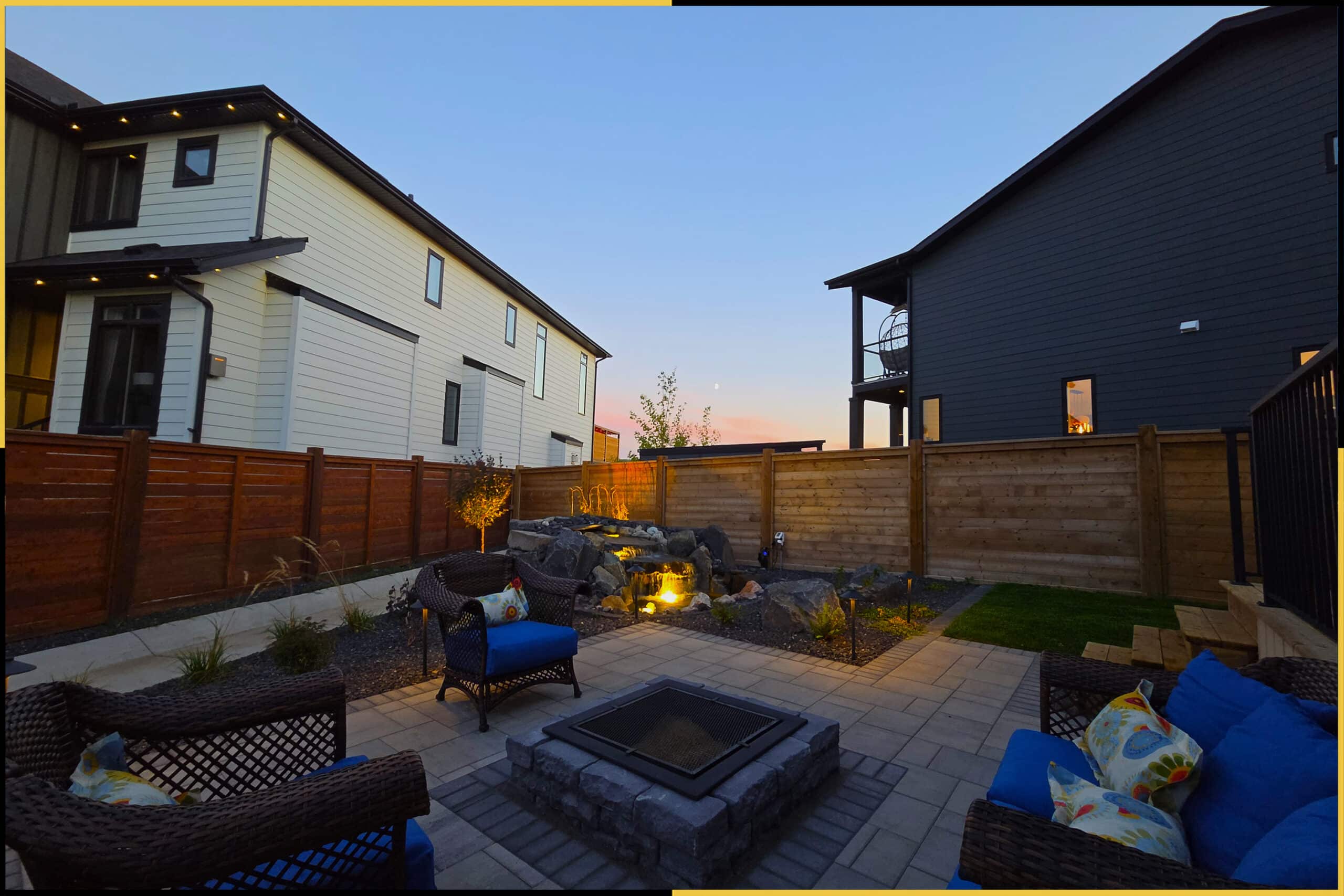 Rockland Park — firepit lounge and lit water feature at twilight